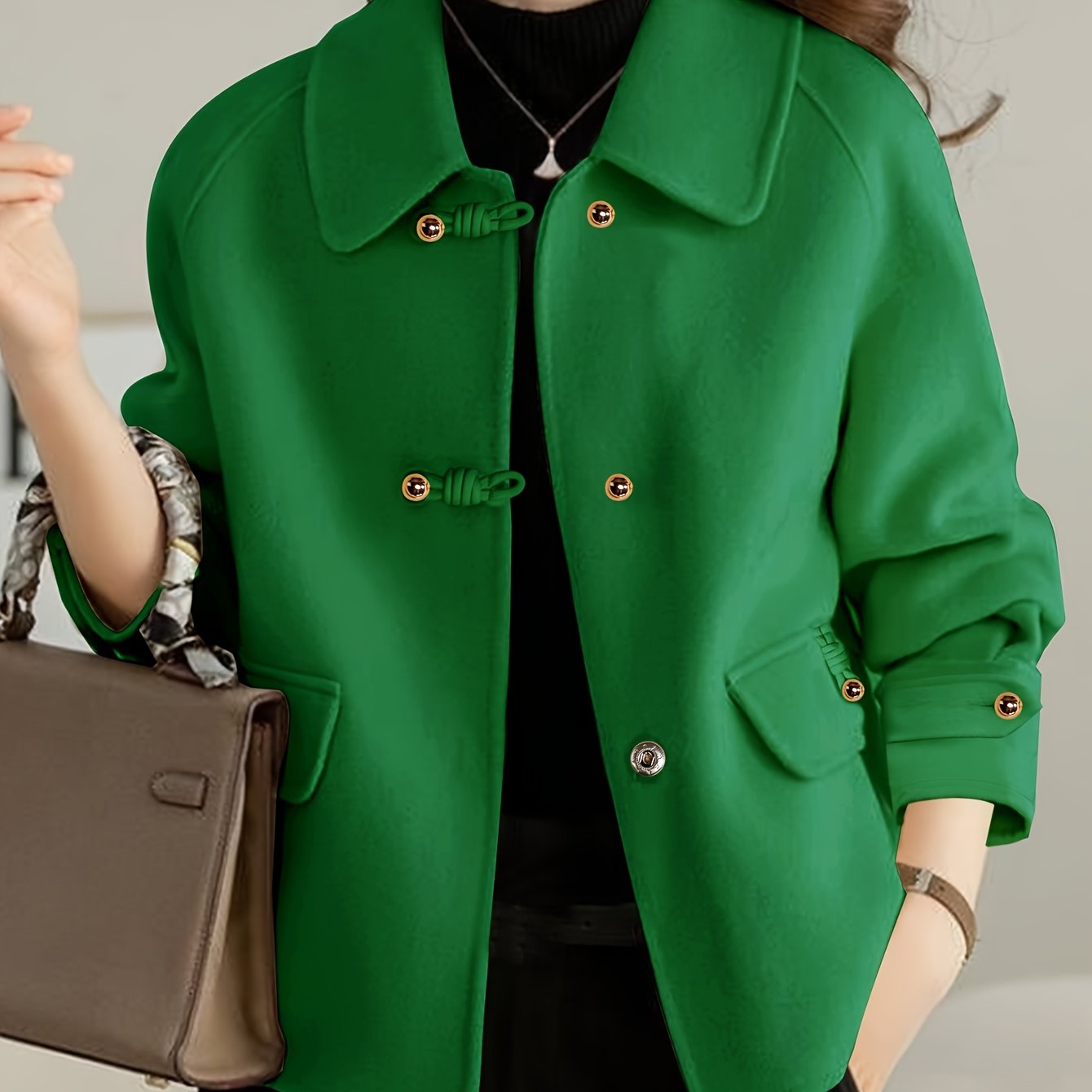 Elegante tweedblazer voor dames met Peter Pan-kraag en parelknopen.
