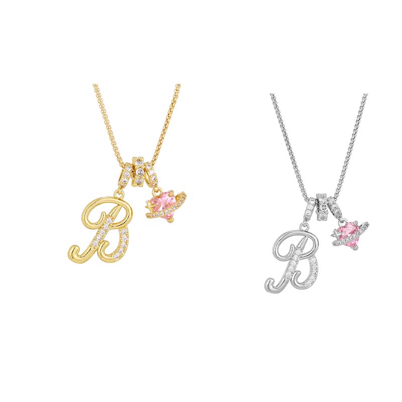 Collier avec initiale et breloque cœur rose