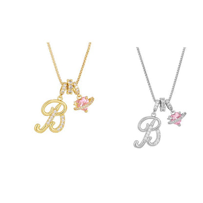 Collier avec initiale et breloque cœur rose