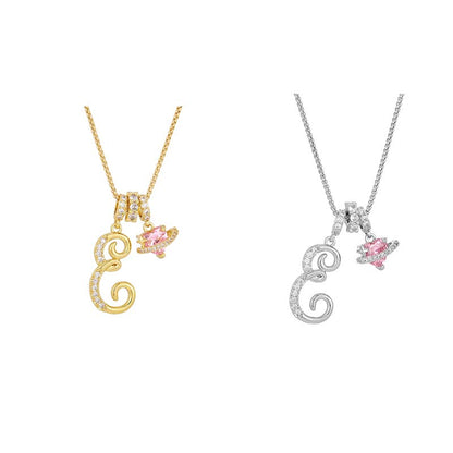 Collier avec initiale et breloque cœur rose