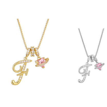 Collier avec initiale et breloque cœur rose