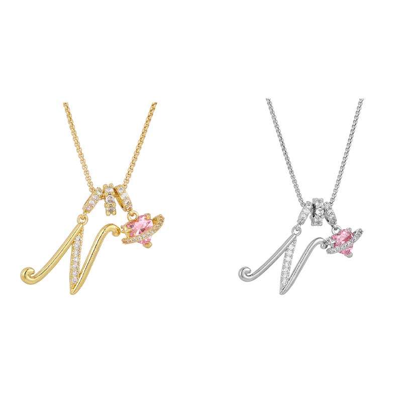 Collier avec initiale et breloque cœur rose