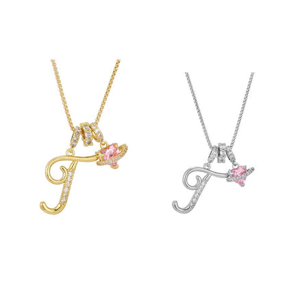 Collier avec initiale et breloque cœur rose